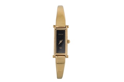 Lot 475 - A LADY'S GUCCI WRIST WATCH, horse bit bracelet...