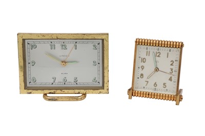 Lot 422 - TWO VINTAGE CLOCKS, brass framed