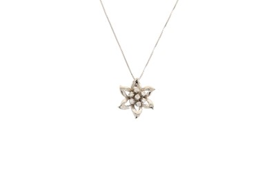 Lot 290 - A DIAMOND CLUSTER PENDANT, modelled as a...