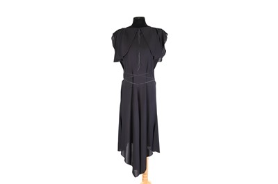 Lot 565 - A LADY'S ALAIA PARIS BLACK EVENING DRESS, the...