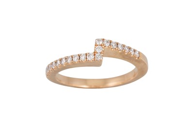 Lot 167 - A DIAMOND SET BAND, of twist design, mounted...