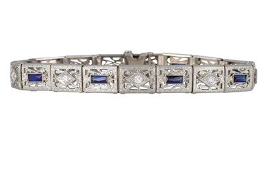 Lot 136 - A LATE ART DECO DIAMOND AND STONE SET COCKTAIL...
