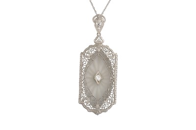 Lot 139 - A ROCK CRYSTAL AND DIAMOND PENDANT, the...