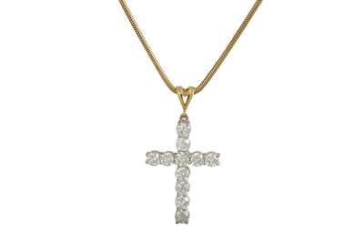 Lot 452 - A DIAMOND SET CROSS, the brilliant cut...