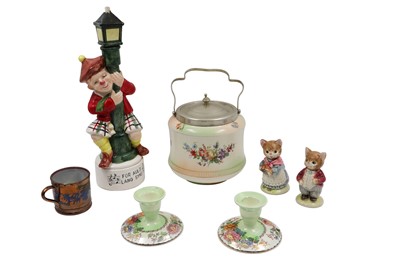 Lot 647 - A MUSICAL NOVELTY DRINKS BOTTLE, plays Auld...