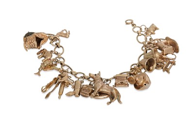 Lot 101 - A 9CT YELLOW GOLD CHARM BRACELET, various...