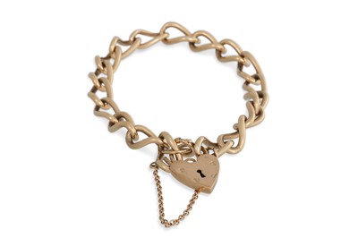 Lot 347 - A 9CT GOLD CURB LINK BRACELET, with a padlock,...