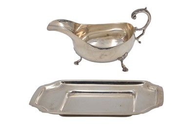Lot 468 - A MODERN ROYAL IRISH SILVER HELMET SHAPED...