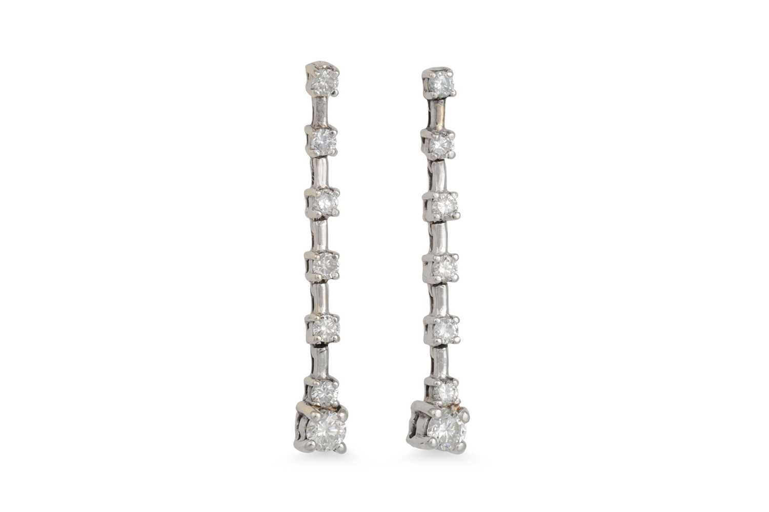 Lot 63 - A PAIR OF DIAMOND DROP EARRINGS, the brilliant...