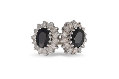Lot 41 - A DIAMOND AND SAPPHIRE DOUBLE CLUSTER RING,...