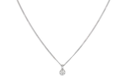 Lot 208 - A DIAMOND CLUSTER PENDANT, the brilliant cut...