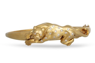 Lot 112 - AN 18CT GOLD BANGLE, with applied diamond set...