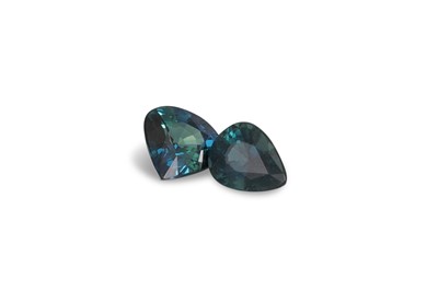 Lot 146 - AN UNMOUNTED PEAR SHAPED SAPPHIRE, and a heart...