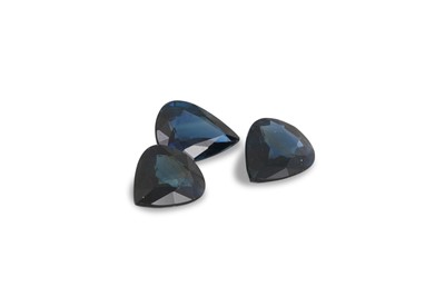 Lot 147 - THREE UNMOUNTED PEAR CUT SAPPHIRES,  weight of...