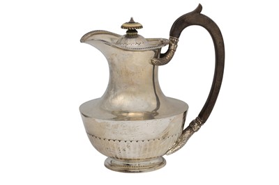 Lot 491 - A SILVER WATER POT, 743 g.