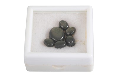 Lot 149 - FIVE UNMOUNTED CABOCHON BLACK SAPPHIRES,...