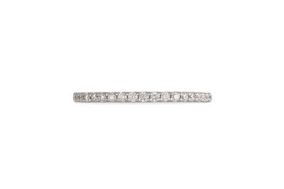 Lot 194 - A DIAMOND HALF ETERNITY RING, the brilliant...