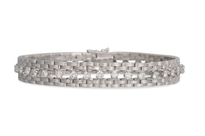 Lot 231 - A VINTAGE DIAMOND SET BRACELET, the centre...