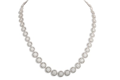 Lot 236 - A DIAMOND SET NECKLACE, set with graduated...