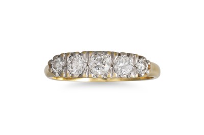 Lot 310 - A FIVE STONE DIAMOND RING, the graduated...