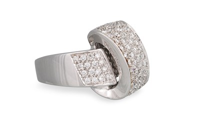 Lot 313 - A DIAMOND DRESS RING, of knot form with pavé...