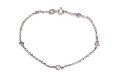 Lot 365 - A PINK SAPPHIRE AND DIAMOND BRACELET, the...