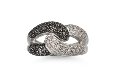 Lot 2 - A PAVÉ SET BLACK GEM AND WHITE DIAMOND RING,...