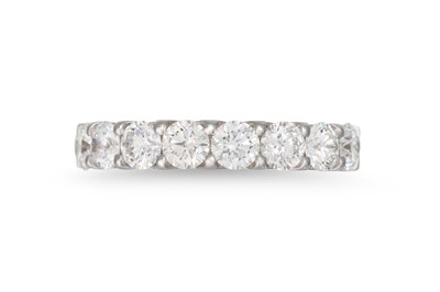 Lot 222 - A DIAMOND HALF ETERNITY RING, the brilliant...