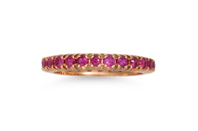 Lot 263 - A RUBY FULL BANDED ETERNITY RING, mounted in...