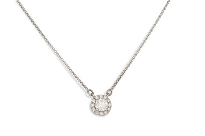 Lot 266 - A DIAMOND CLUSTER PENDANT, the brilliant cut...