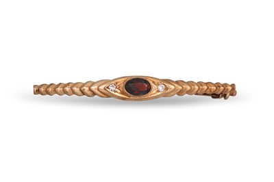 Lot 64 - A GOLD GARNET AND CUBIC ZIRCONIA BROOCH