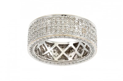 Lot 143 - A DIAMOND CLUSTER RING, comprising four rows...