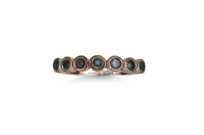 Lot 179 - A BLUE GEM STONE RING, mounted in 9ct white...