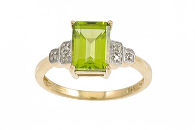 Lot 149 - A PERIDOT RING, diamond shoulders, size K - L