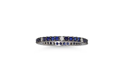 Lot 361 - A DIAMOND AND SAPPHIRE ETERNITY RING, circular...