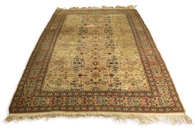 Lot 579 - A MID 20TH CENTURY ORIENTAL WOOL RUG, stylised...