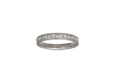 Lot 347 - A DIAMOND HALF ETERNITY RING, the princess cut...