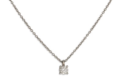 Lot 348 - A TIFFANY DIAMOND SOLITAIRE PENDANT, the round...