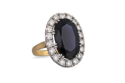 Lot 341 - A SAPPHIRE AND DIAMOND CLUSTER RING, the oval...