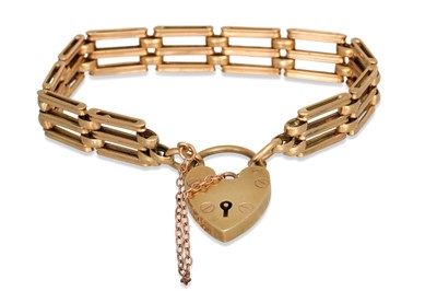 Lot 17 - A 9CT YELLOW GOLD THREE BAR GATE BRACELET,...
