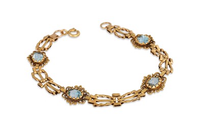 Lot 68 - A TOPAZ SET BRACELET, of openwork form,...