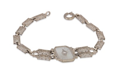 Lot 103 - AN ART DECO STYLE DIAMOND BRACELET, mounted in...