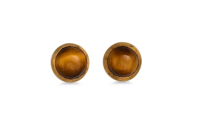 Lot 110 - A PAIR OF TIGER EYE EARRINGS, mounted in...