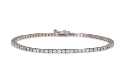 Lot 350 - A DIAMOND LINE BRACELET, the brilliant cut...
