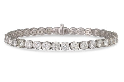 Lot 351 - A DIAMOND LINE BRACELET, the brilliant cut...