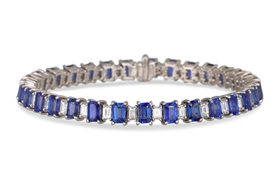 Lot 356 - A DIAMOND AND SAPPHIRE BRACELET, set with...