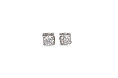 Lot 365 - A PAIR OF DIAMOND STUD EARRINGS, the brilliant...