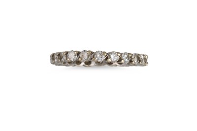 Lot 162 - A DIAMOND ETERNITY RING, the brilliant cut...
