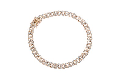 Lot 315 - A DIAMOND SET CURB LINK BRACELET, mounted in...
