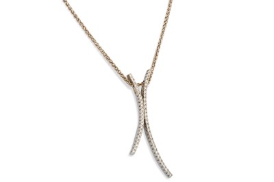 Lot 132 - A DIAMOND PENDANT, of shaped form, mounted in...